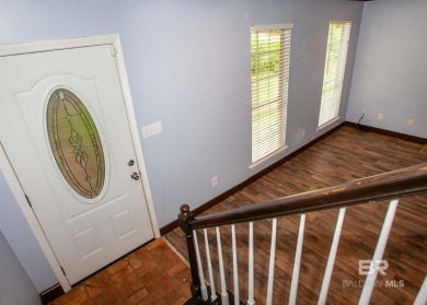 This Charming Two Story Cottage Is The Perfect Place To Call on Lake Forest Yacht and Country Club in Alabama - for sale on GolfHomes.com, golf home, golf lot