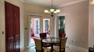 Discover this beautifully crafted 4-bedroom, all-brick home in on Landings Golf Club in Georgia - for sale on GolfHomes.com, golf home, golf lot