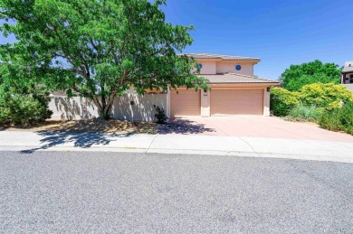 Welcome to this beautifully maintained 2-story stucco home in on Tiara Rado Golf Course in Colorado - for sale on GolfHomes.com, golf home, golf lot