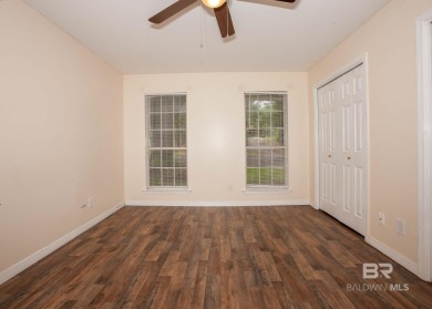 This Charming Two Story Cottage Is The Perfect Place To Call on Lake Forest Yacht and Country Club in Alabama - for sale on GolfHomes.com, golf home, golf lot
