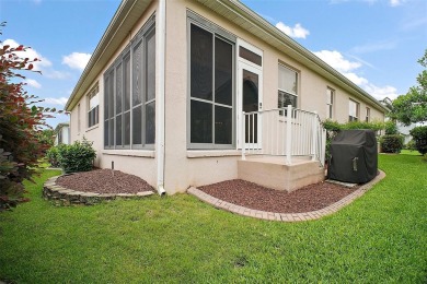 BOND PAID! STUNNING TURNKEY SOMERSET MODEL WITH GOLF CART on The Links of Spruce Creek in Florida - for sale on GolfHomes.com, golf home, golf lot