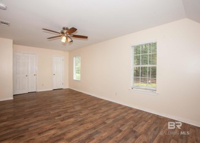 This Charming Two Story Cottage Is The Perfect Place To Call on Lake Forest Yacht and Country Club in Alabama - for sale on GolfHomes.com, golf home, golf lot