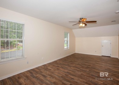 This Charming Two Story Cottage Is The Perfect Place To Call on Lake Forest Yacht and Country Club in Alabama - for sale on GolfHomes.com, golf home, golf lot