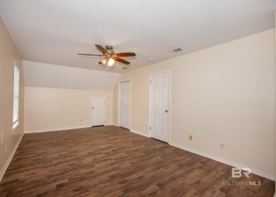 This Charming Two Story Cottage Is The Perfect Place To Call on Lake Forest Yacht and Country Club in Alabama - for sale on GolfHomes.com, golf home, golf lot