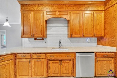 Discover this beautifully crafted 3-bedroom, all-brick home in on Landings Golf Club in Georgia - for sale on GolfHomes.com, golf home, golf lot