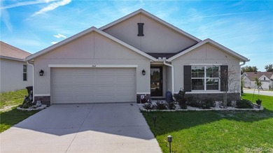 Welcome to your dream GOLF-COURSE RETREAT in the FAIRWAYS AT on Twisted Oaks Golf Club in Florida - for sale on GolfHomes.com, golf home, golf lot