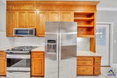 Discover this beautifully crafted 3-bedroom, all-brick home in on Landings Golf Club in Georgia - for sale on GolfHomes.com, golf home, golf lot