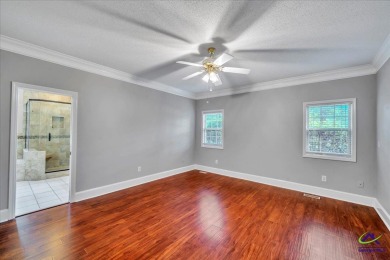 Discover this beautifully crafted 3-bedroom, all-brick home in on Landings Golf Club in Georgia - for sale on GolfHomes.com, golf home, golf lot