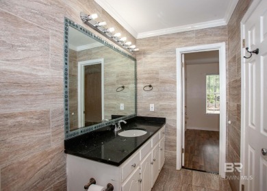 This Charming Two Story Cottage Is The Perfect Place To Call on Lake Forest Yacht and Country Club in Alabama - for sale on GolfHomes.com, golf home, golf lot