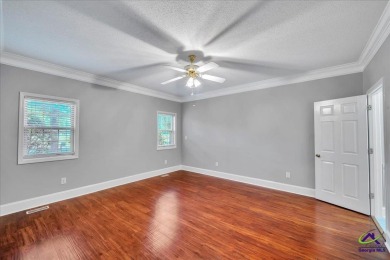 Discover this beautifully crafted 3-bedroom, all-brick home in on Landings Golf Club in Georgia - for sale on GolfHomes.com, golf home, golf lot