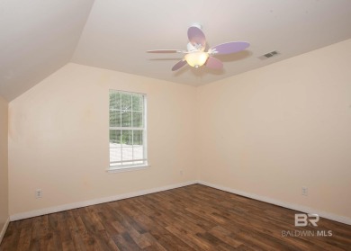 This Charming Two Story Cottage Is The Perfect Place To Call on Lake Forest Yacht and Country Club in Alabama - for sale on GolfHomes.com, golf home, golf lot