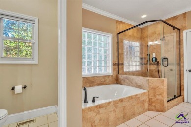 Discover this beautifully crafted 3-bedroom, all-brick home in on Landings Golf Club in Georgia - for sale on GolfHomes.com, golf home, golf lot