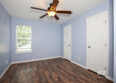 This Charming Two Story Cottage Is The Perfect Place To Call on Lake Forest Yacht and Country Club in Alabama - for sale on GolfHomes.com, golf home, golf lot
