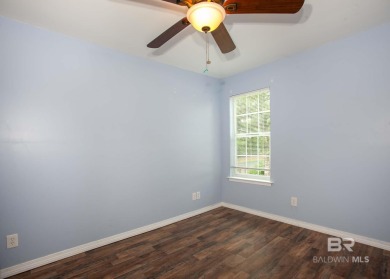 This Charming Two Story Cottage Is The Perfect Place To Call on Lake Forest Yacht and Country Club in Alabama - for sale on GolfHomes.com, golf home, golf lot