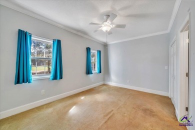 Discover this beautifully crafted 3-bedroom, all-brick home in on Landings Golf Club in Georgia - for sale on GolfHomes.com, golf home, golf lot