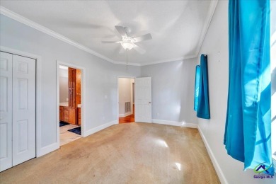 Discover this beautifully crafted 3-bedroom, all-brick home in on Landings Golf Club in Georgia - for sale on GolfHomes.com, golf home, golf lot