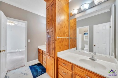 Discover this beautifully crafted 3-bedroom, all-brick home in on Landings Golf Club in Georgia - for sale on GolfHomes.com, golf home, golf lot