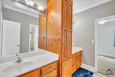 Discover this beautifully crafted 3-bedroom, all-brick home in on Landings Golf Club in Georgia - for sale on GolfHomes.com, golf home, golf lot