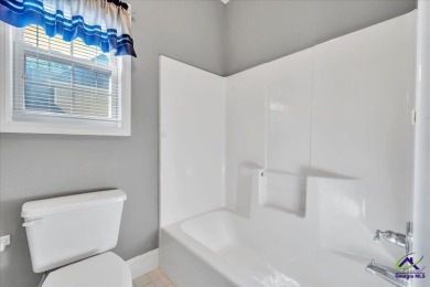 Discover this beautifully crafted 3-bedroom, all-brick home in on Landings Golf Club in Georgia - for sale on GolfHomes.com, golf home, golf lot