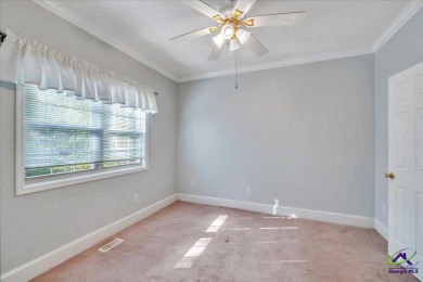Discover this beautifully crafted 3-bedroom, all-brick home in on Landings Golf Club in Georgia - for sale on GolfHomes.com, golf home, golf lot