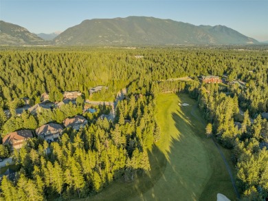 Nestled amongst tall pines overlooking the 6th green of the Golf on Meadow Lake Golf Resort in Montana - for sale on GolfHomes.com, golf home, golf lot