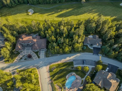 Nestled amongst tall pines overlooking the 6th green of the Golf on Meadow Lake Golf Resort in Montana - for sale on GolfHomes.com, golf home, golf lot