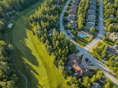 Nestled amongst tall pines overlooking the 6th green of the Golf on Meadow Lake Golf Resort in Montana - for sale on GolfHomes.com, golf home, golf lot