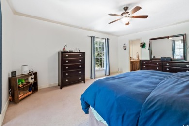 This beautiful 4 bedroom 2.5 bathroom home is tucked away on a on The Tradition Golf Club in South Carolina - for sale on GolfHomes.com, golf home, golf lot