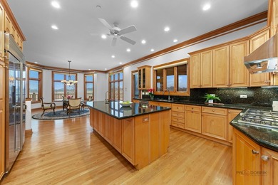 Incredible all-brick 5-bedroom, 5.2-bath home nestled on a quiet on The Merit Club in Illinois - for sale on GolfHomes.com, golf home, golf lot