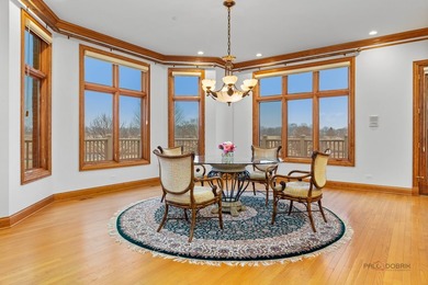 Incredible all-brick 5-bedroom, 5.2-bath home nestled on a quiet on The Merit Club in Illinois - for sale on GolfHomes.com, golf home, golf lot