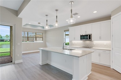 WOW! Newer home on the lake and under $500,000! This 2021 on Oak Harbor Country Club in Florida - for sale on GolfHomes.com, golf home, golf lot