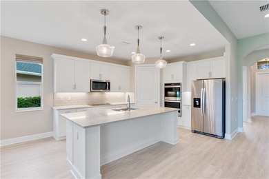 WOW! Newer home on the lake and under $500,000! This 2021 on Oak Harbor Country Club in Florida - for sale on GolfHomes.com, golf home, golf lot