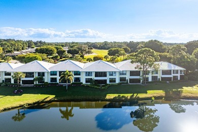 Wake up to tranquil lake and golf course views in this welcoming on Quail Ridge Golf Course and Country Club in Florida - for sale on GolfHomes.com, golf home, golf lot
