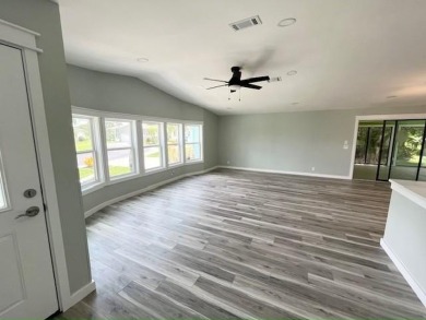 Beautifully renovated 2BD/2BA stucco home perfectly blends on Del Tura Golf and Country Club in Florida - for sale on GolfHomes.com, golf home, golf lot