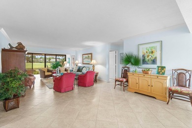 Wake up to tranquil lake and golf course views in this welcoming on Quail Ridge Golf Course and Country Club in Florida - for sale on GolfHomes.com, golf home, golf lot