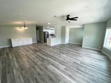 Beautifully renovated 2BD/2BA stucco home perfectly blends on Del Tura Golf and Country Club in Florida - for sale on GolfHomes.com, golf home, golf lot