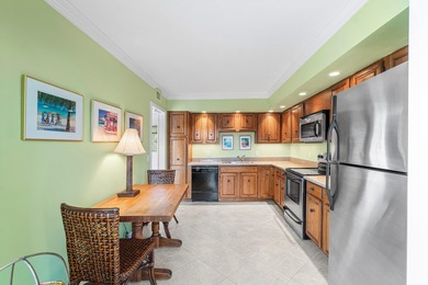 Wake up to tranquil lake and golf course views in this welcoming on Quail Ridge Golf Course and Country Club in Florida - for sale on GolfHomes.com, golf home, golf lot