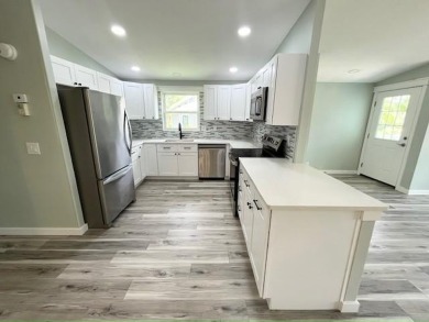 Beautifully renovated 2BD/2BA stucco home perfectly blends on Del Tura Golf and Country Club in Florida - for sale on GolfHomes.com, golf home, golf lot