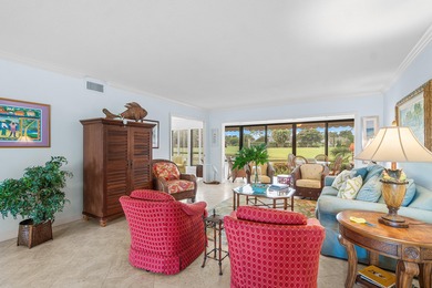 Wake up to tranquil lake and golf course views in this welcoming on Quail Ridge Golf Course and Country Club in Florida - for sale on GolfHomes.com, golf home, golf lot