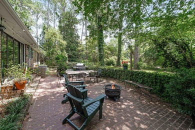 This beautiful 4 bedroom 2.5 bathroom home is tucked away on a on The Tradition Golf Club in South Carolina - for sale on GolfHomes.com, golf home, golf lot