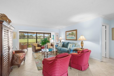 Wake up to tranquil lake and golf course views in this welcoming on Quail Ridge Golf Course and Country Club in Florida - for sale on GolfHomes.com, golf home, golf lot