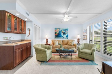 Wake up to tranquil lake and golf course views in this welcoming on Quail Ridge Golf Course and Country Club in Florida - for sale on GolfHomes.com, golf home, golf lot