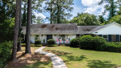 This beautiful 4 bedroom 2.5 bathroom home is tucked away on a on The Tradition Golf Club in South Carolina - for sale on GolfHomes.com, golf home, golf lot