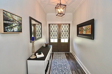 1.48 acres occupies this farmhouse style home with a on Stone Creek Golf Club in Georgia - for sale on GolfHomes.com, golf home, golf lot