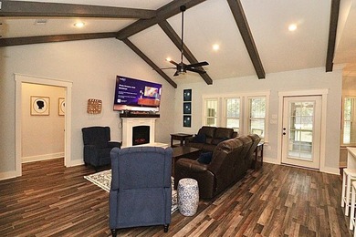 1.48 acres occupies this farmhouse style home with a on Stone Creek Golf Club in Georgia - for sale on GolfHomes.com, golf home, golf lot