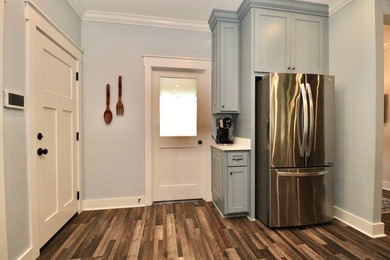 1.48 acres occupies this farmhouse style home with a on Stone Creek Golf Club in Georgia - for sale on GolfHomes.com, golf home, golf lot