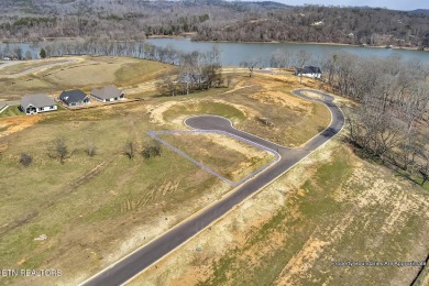 Come build your dream home in a premier gated golf and lakefront on Tennessee National Golf Club in Tennessee - for sale on GolfHomes.com, golf home, golf lot