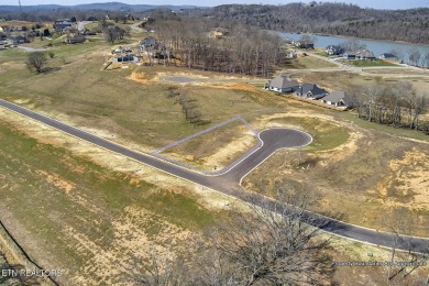 Come build your dream home in a premier gated golf and lakefront on Tennessee National Golf Club in Tennessee - for sale on GolfHomes.com, golf home, golf lot