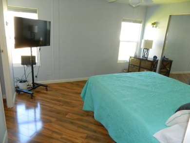 This 1984 Sherman home is 24x40 offering you 960 sq ft of open on Grasslands Golf and Country Club in Florida - for sale on GolfHomes.com, golf home, golf lot
