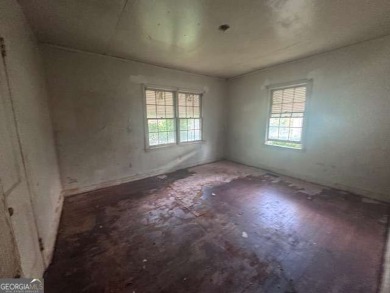Charming East Lake Bungalow - Ideal for First-Time Buyers or on Charlie Yates Golf Course in Georgia - for sale on GolfHomes.com, golf home, golf lot